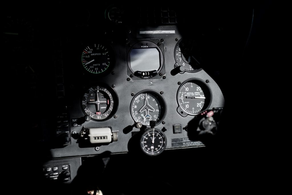 Airplane dials and controls in black and white. Department of Defense.