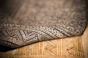 Close up image of blue and yellow carpets