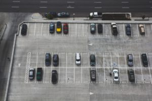 Overhead image of parking lot with cars. City of Lincoln.