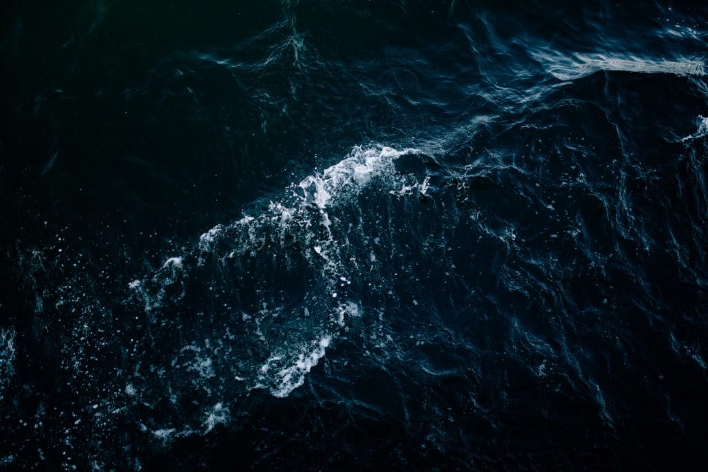 Image of dark and vaguely stormy ocean as seen from above. Maritime Administration.