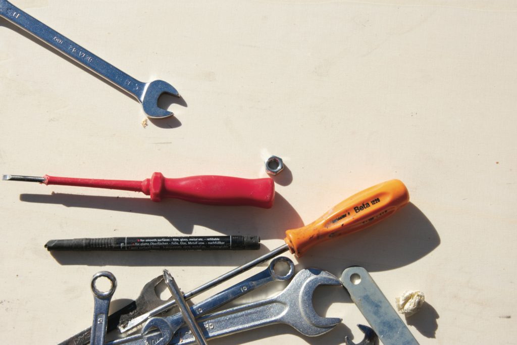 Multiple tools laying on ground. Tools for an RFP
