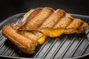 Grilled Cheese Sandwich on grill top. Compliance.