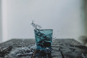 take care of yourself Glass of Water with Water Spilling